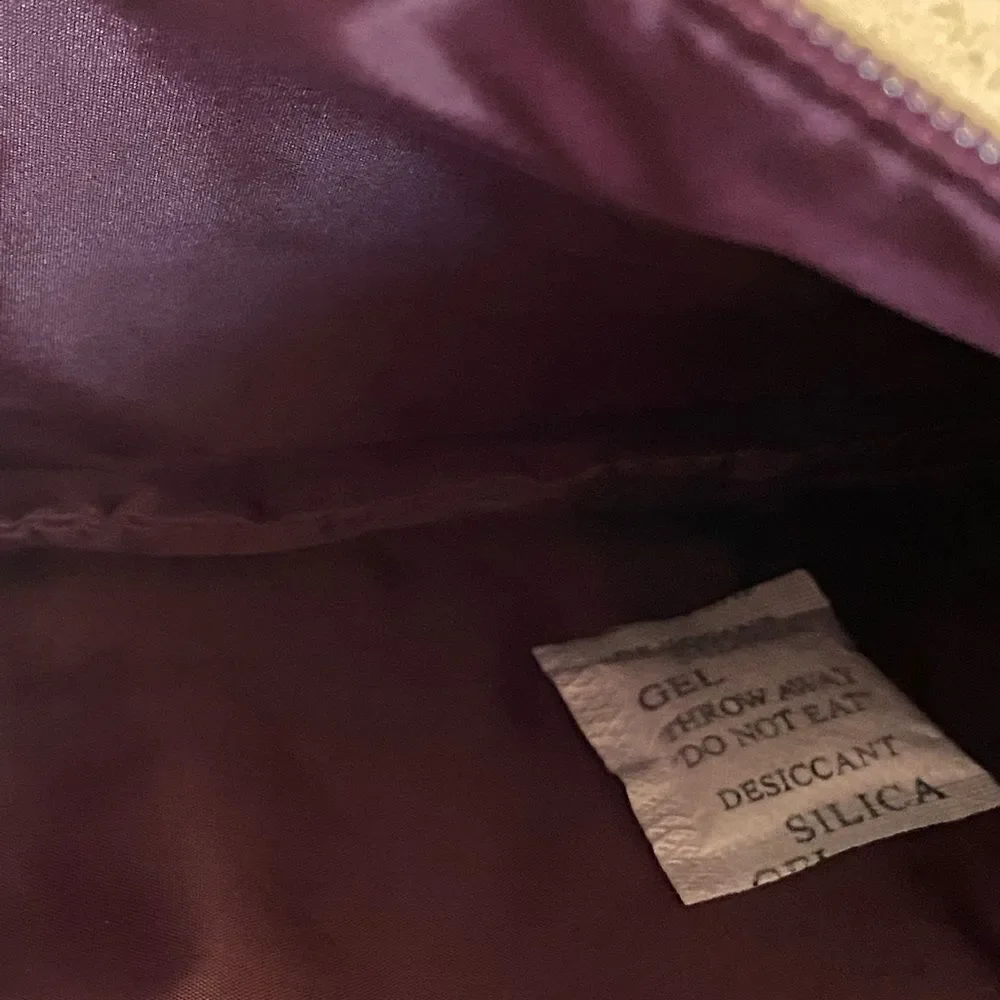 Two Estée Lauder NWOT make up bags